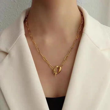 The Chelsea Toggle, a stainless steel, gold plated paper link chain necklace