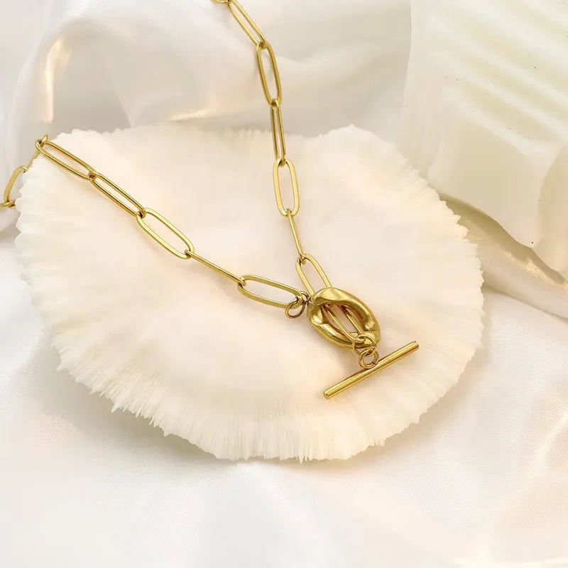 The Chelsea Toggle, a stainless steel, gold plated paper link chain necklace